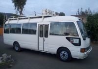 Toyota Coaster bus, perfect for larger groups